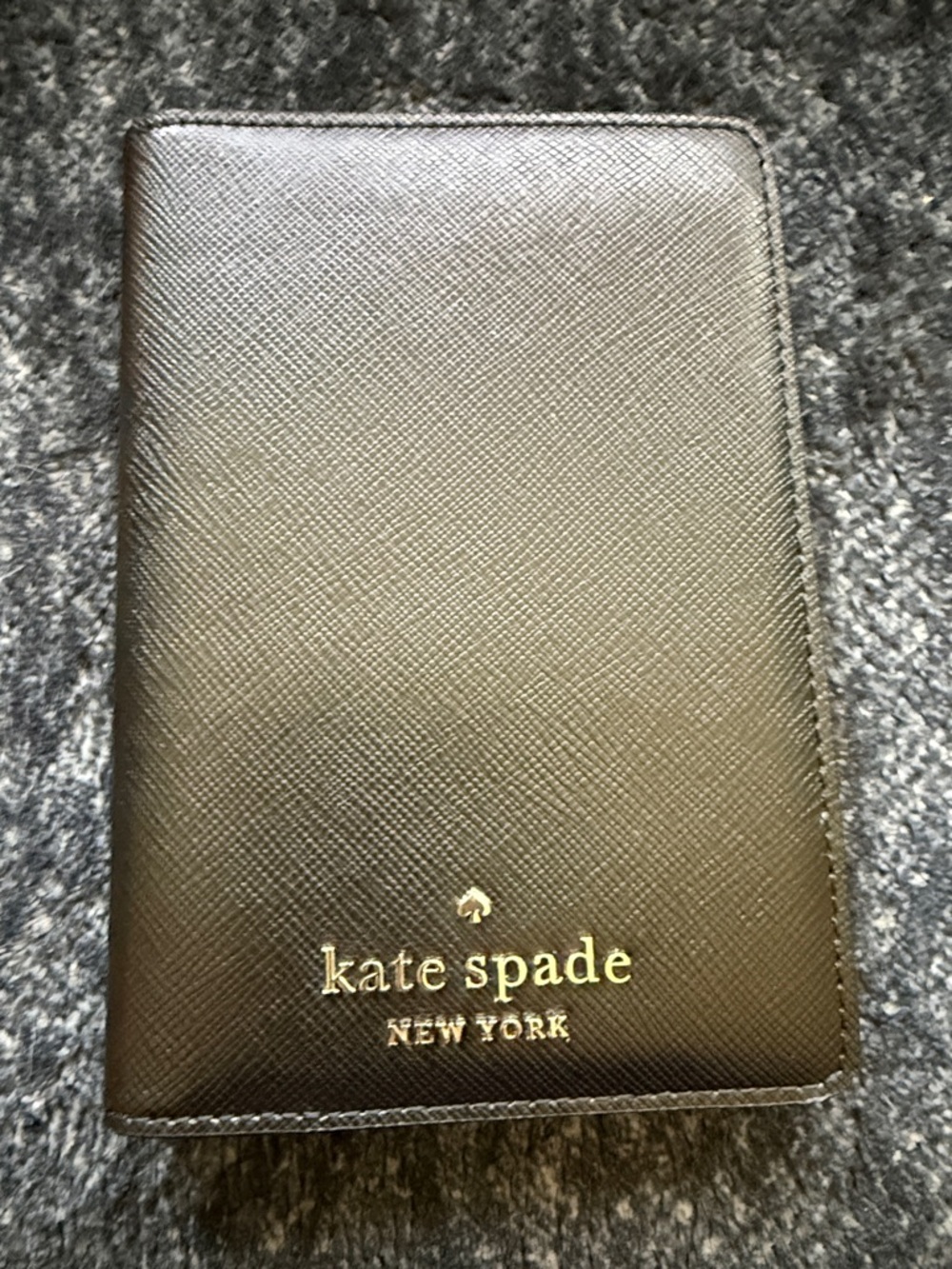 kate spade black Saffiano passport cover with gold logo